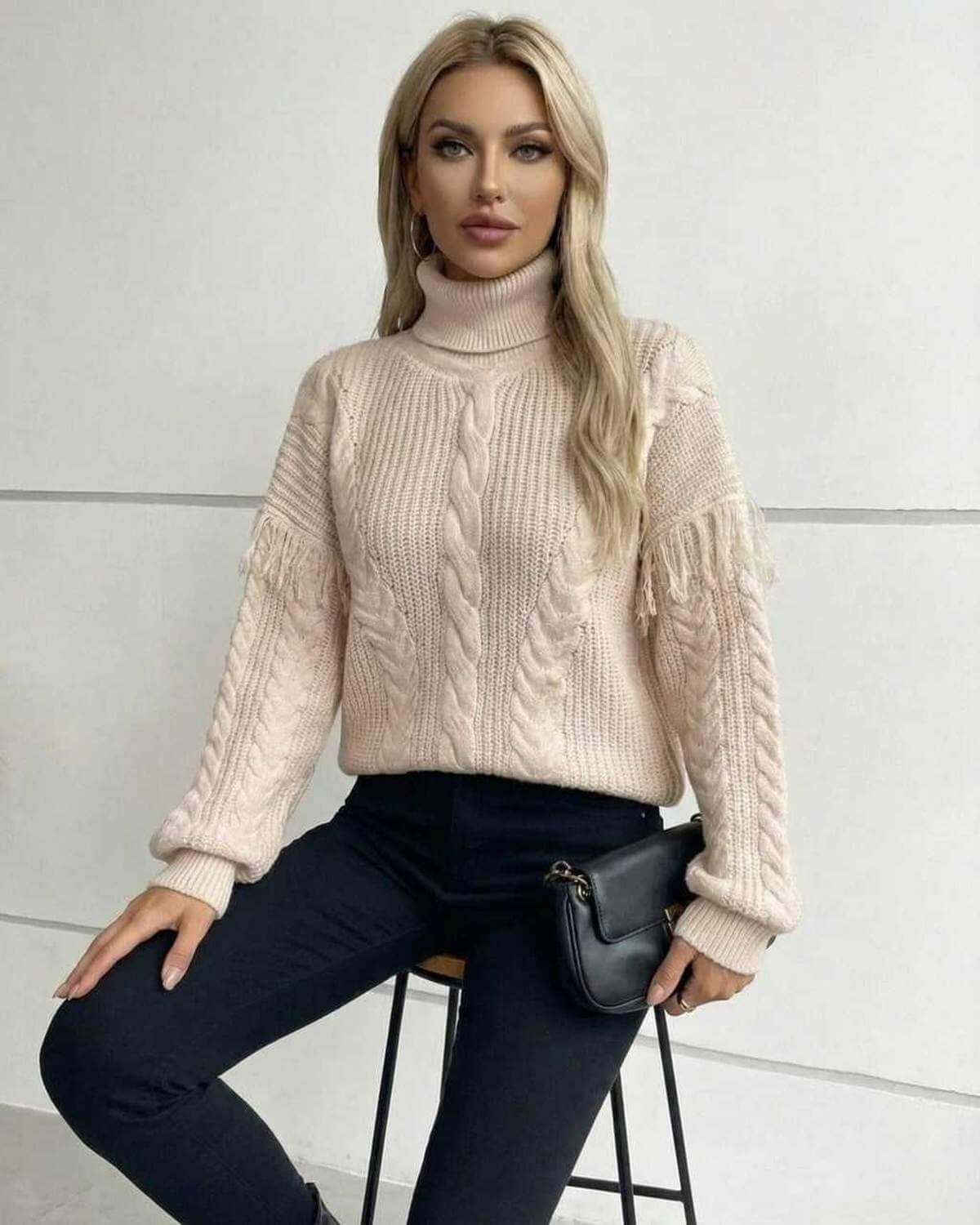 Women’s Beige Turtleneck Vienna Sweater by Lauven, showcasing cable knit design and fringe detail, perfect for fall winter.