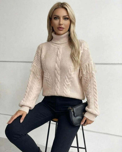 Women’s Beige Turtleneck Vienna Sweater by Lauven, showcasing cable knit design and fringe detail, perfect for fall winter.