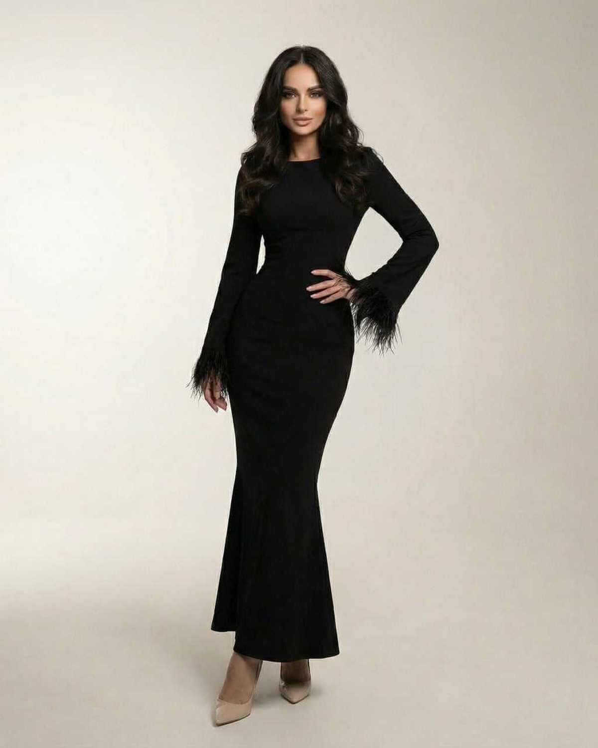 Valencia Maxi Dress by Lauven, black long sleeve mermaid gown with feather cuffs, elegant and sophisticated design.