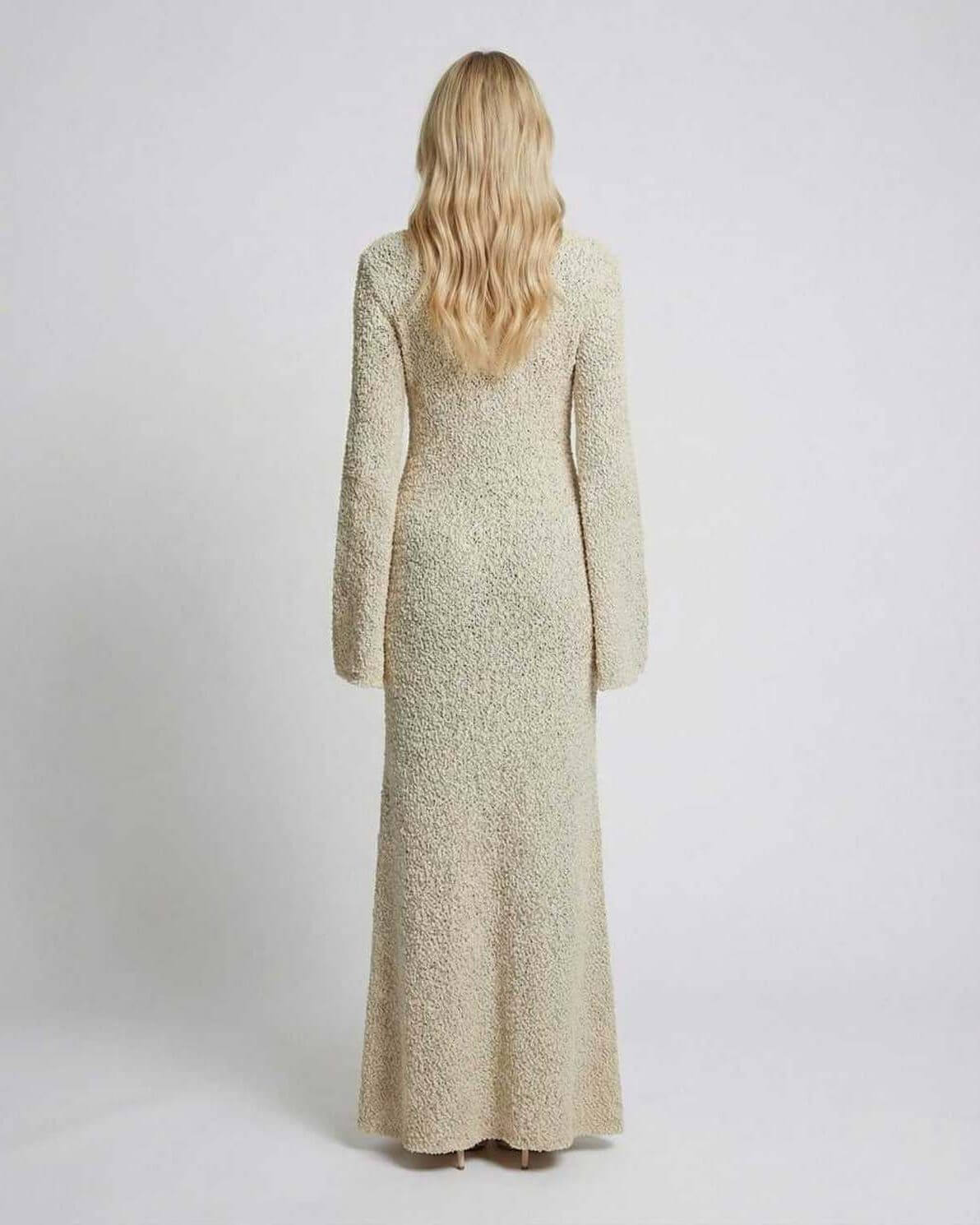 Sienna Maxi Dress back view, beige maxi sweater dress by Lauven with long flare sleeves.