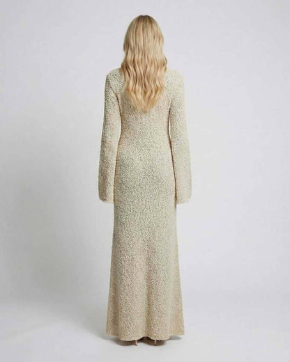Sienna Maxi Dress back view, beige maxi sweater dress by Lauven with long flare sleeves.