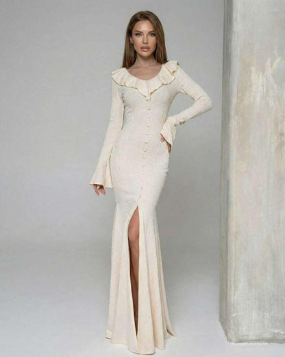 Sorrento Maxi Dress by Lauven - Women’s cream maxi dress with ruffle trim and long flare sleeves, featuring a high slit.