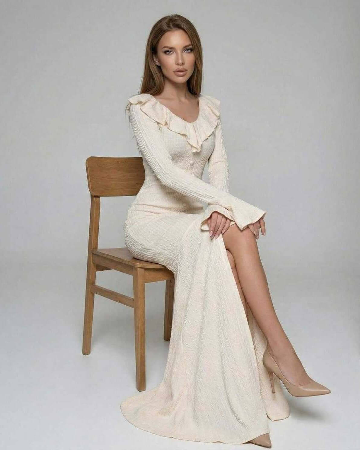 Sorrento Maxi Dress by Lauven - Women's cream maxi dress with ruffle trim and long flare sleeves.