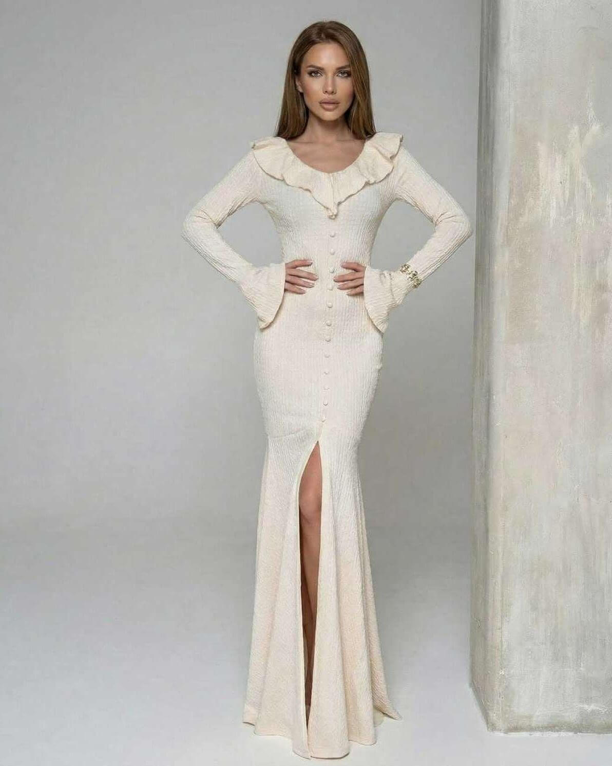 Sorrento Maxi Dress by Lauven - Women’s cream maxi dress with ruffle trim and long flare sleeves.