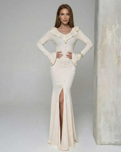 Sorrento Maxi Dress by Lauven - Women’s cream maxi dress with ruffle trim and long flare sleeves.