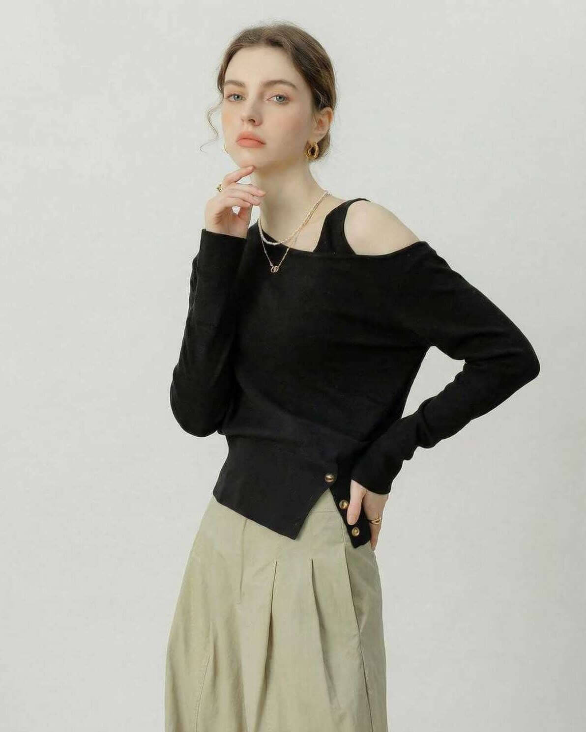 Monaco Pullover by Lauven - Black Off Shoulder Design with Asymmetric Knit Detail, Perfect for Chic Contemporary Wardrobes.