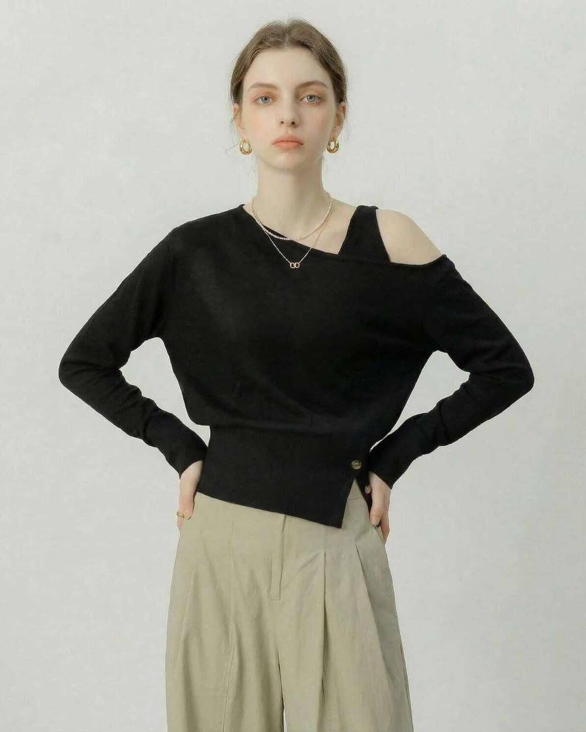 Monaco Pullover by Lauven – Black off shoulder pullover with asymmetric knit detail, stylish and modern silhouette.