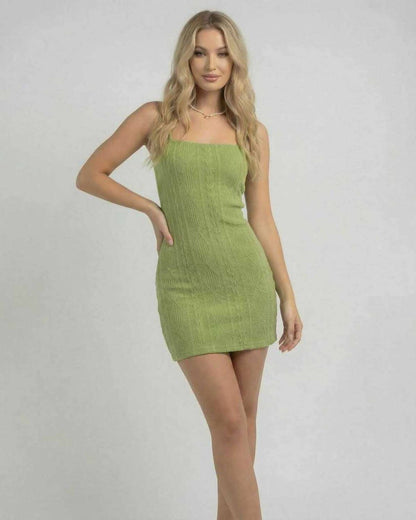 Verona Mini Dress by Lauven – Green bodycon mini dress with open back and textured finish, perfect for modern style.