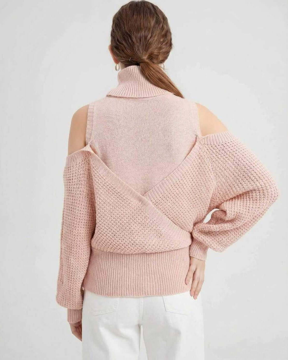Valencia Sweater by Lauven, women's wool turtleneck sweater with cold shoulder detail, back view in light pink.