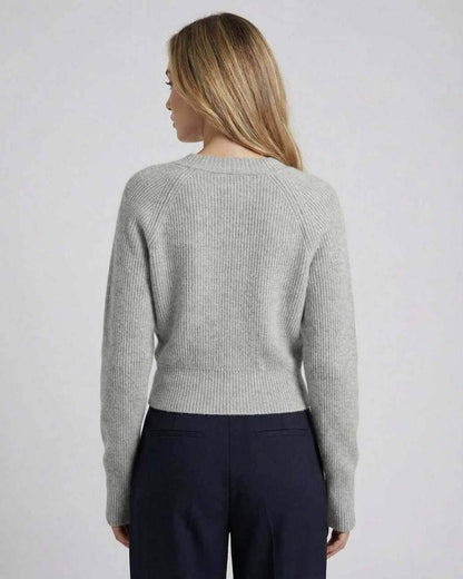 Back view of the Lauven Vienna Sweater, women’s gray ribbed knit long sleeve sweater.