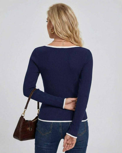 Back view of a woman wearing the Milano Sweater by Lauven, a navy V neck slim fit sweater.