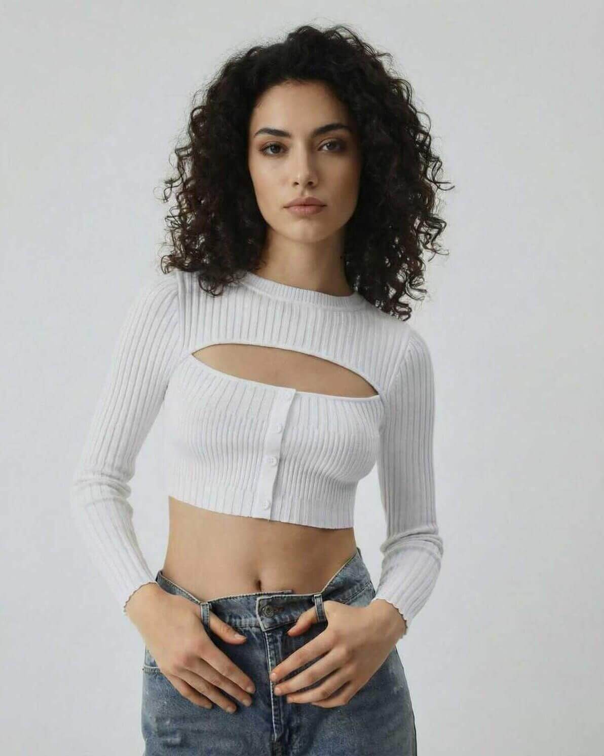 Monaco Top by Lauven, women’s white long sleeve cut out ribbed knit top with button detail.