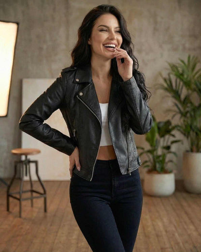Model wearing the Raven Jacket, a women's black leather slim fit moto jacket by Lauven, exuding style and confidence.