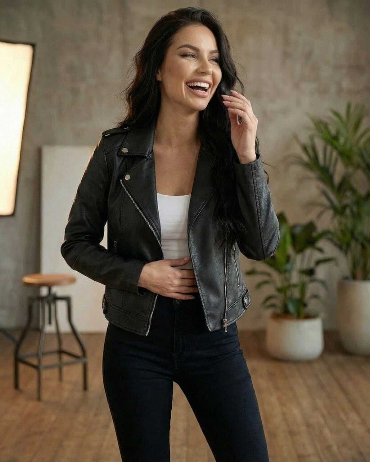 Raven Jacket by Lauven – Women’s black leather moto jacket, slim fit, showcasing a modern look with zipper details.