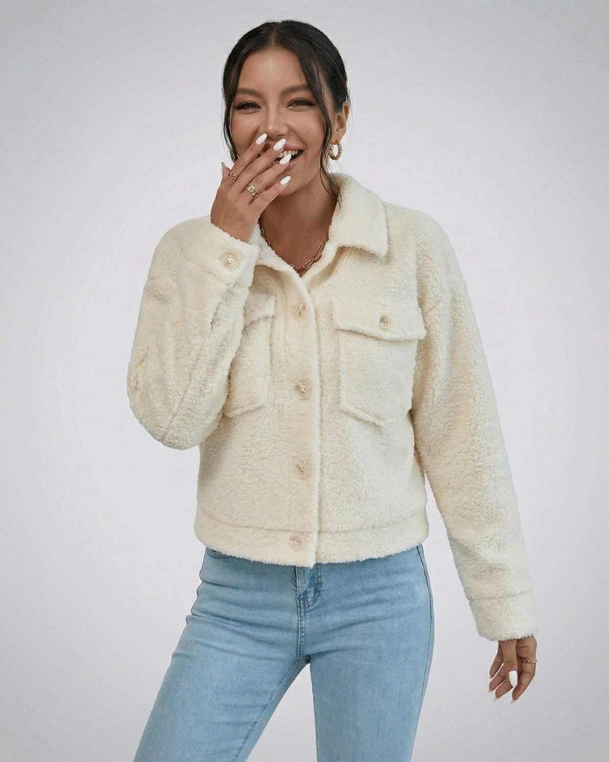 Aspen Jacket by Lauven, a women's faux fur jacket with lapel collar for stylish cold-weather layering.