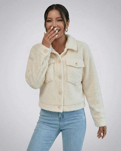 Aspen Jacket by Lauven, a women's faux fur jacket with lapel collar for stylish cold-weather layering.