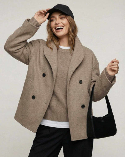 Smiling woman wearing the Verona Jacket by Lauven, a stylish oversized workwear piece for fall.