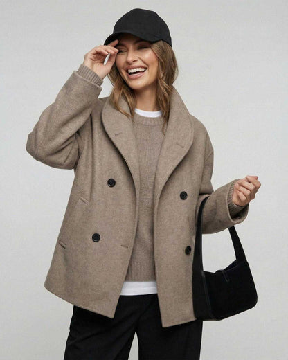 Woman wearing a Verona Jacket by Lauven, showcasing a stylish oversized look for business and fall fashion.