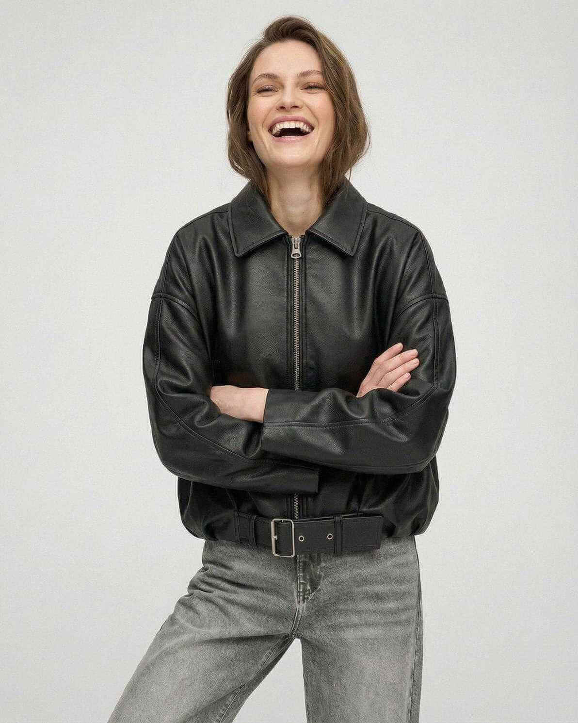 Black Belted Jacket from Lauven, featuring a stylish oversized fit and smooth leather-look finish.