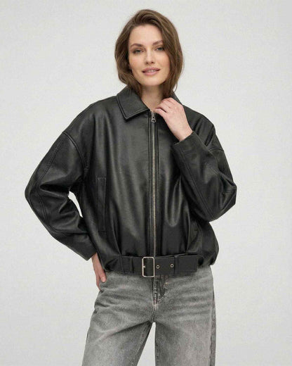 Women wearing a Black Belted Jacket by Lauven, showcasing an oversized silhouette and structured lapel collar.