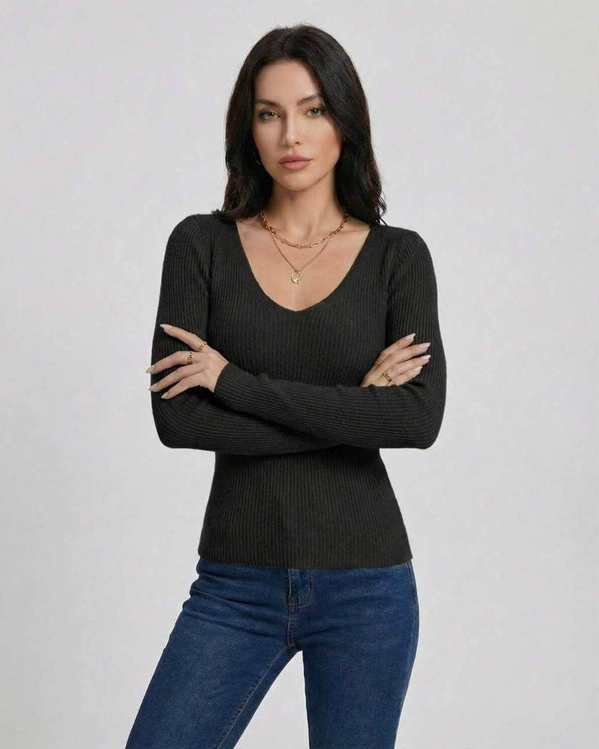 Women wearing the Monaco Pullover by Lauven, a stylish V-neck pullover sweater with a slim fit and long sleeves.