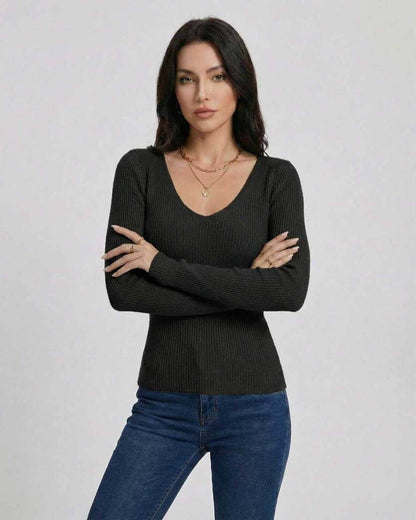 Women wearing the Monaco Pullover by Lauven, a stylish V-neck pullover sweater with a slim fit and long sleeves.