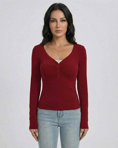 Women’s Sienna Pullover by Lauven, slim fit V-neck long sleeve top with button detail in red.