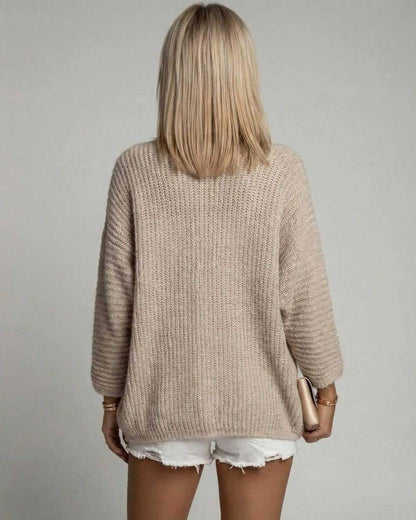 Aspen Cardigan by Lauven – Women's beige open front cardigan sweater viewed from the back.