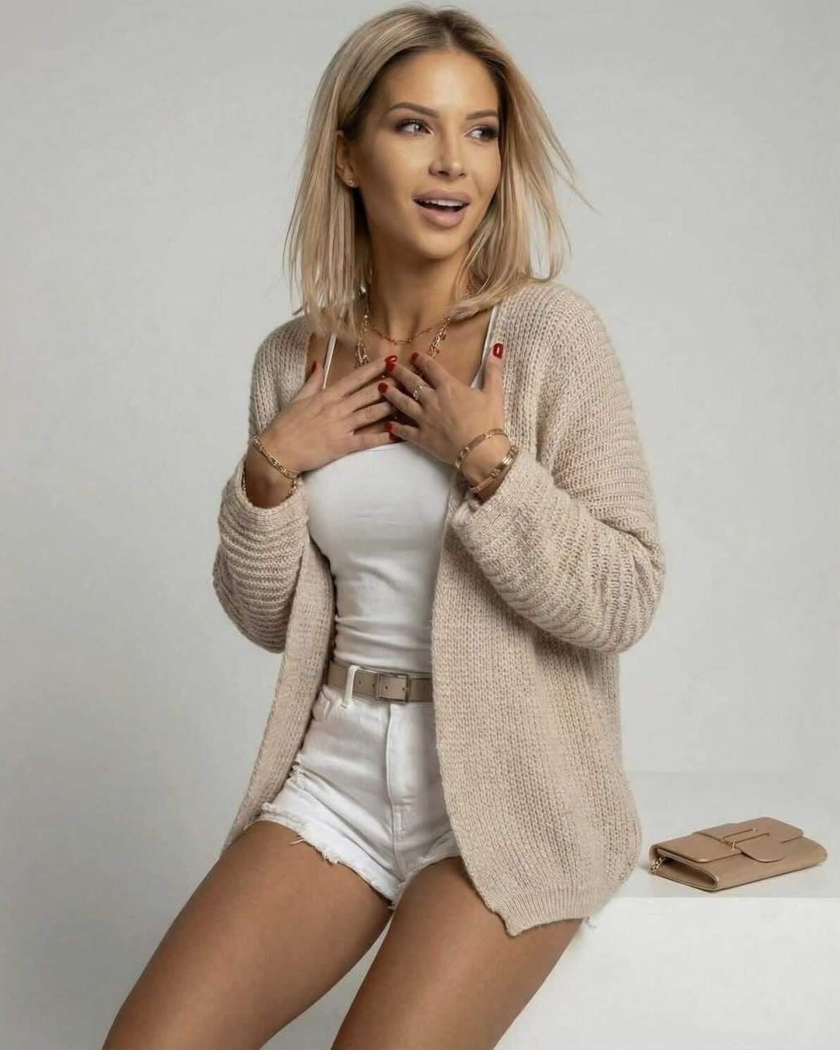 Aspen Cardigan by Lauven – Women’s beige open front cardigan sweater styled with a casual outfit.