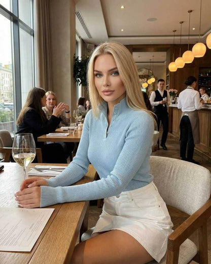 Arden Long Sleeve by Lauven - Women's blue long sleeve shirt with button collar, styled elegantly in a restaurant setting.