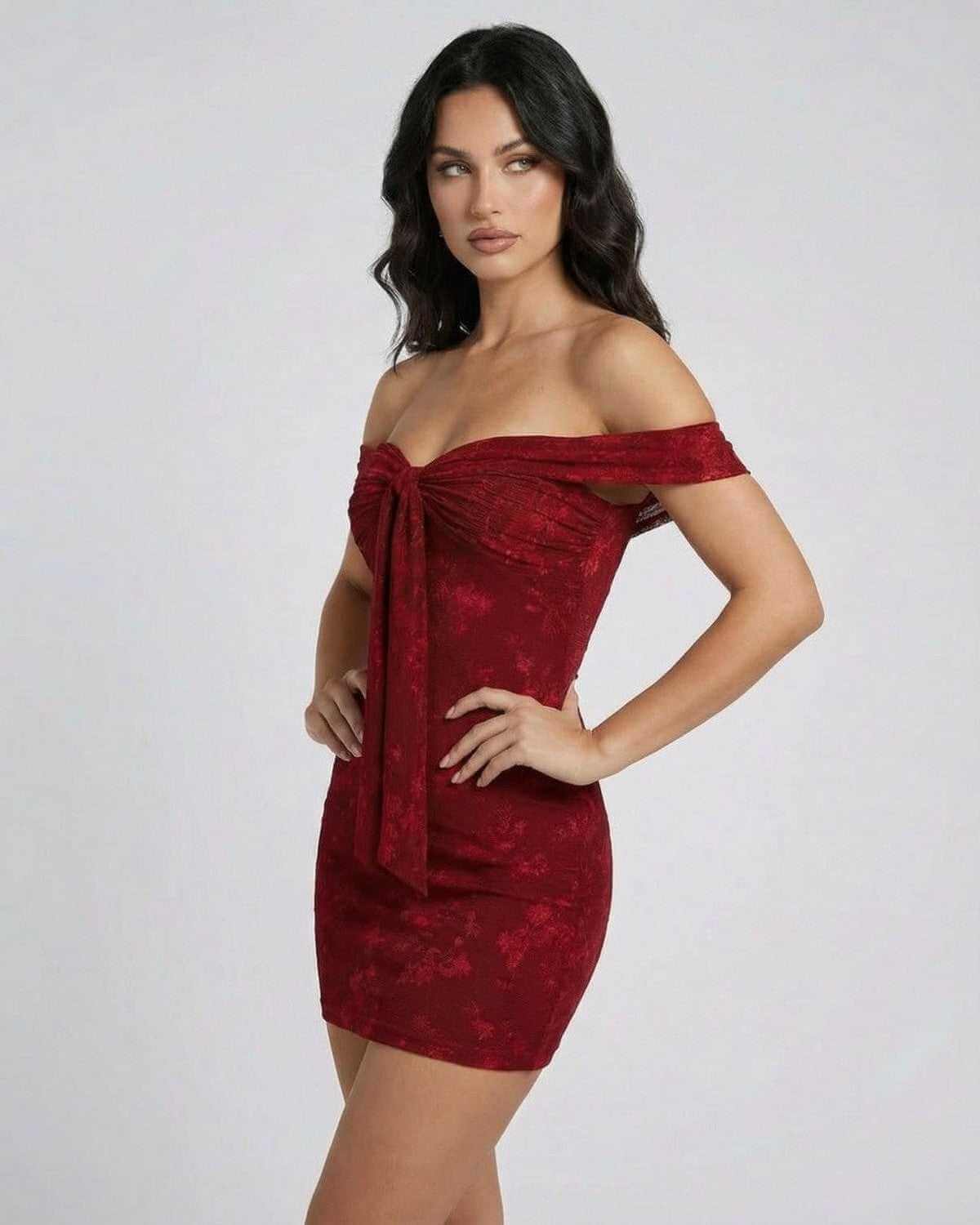 Verona Mini Dress by SLIMONA, off-the-shoulder jacquard sheath in rich red, showcasing sleek and elegant design.