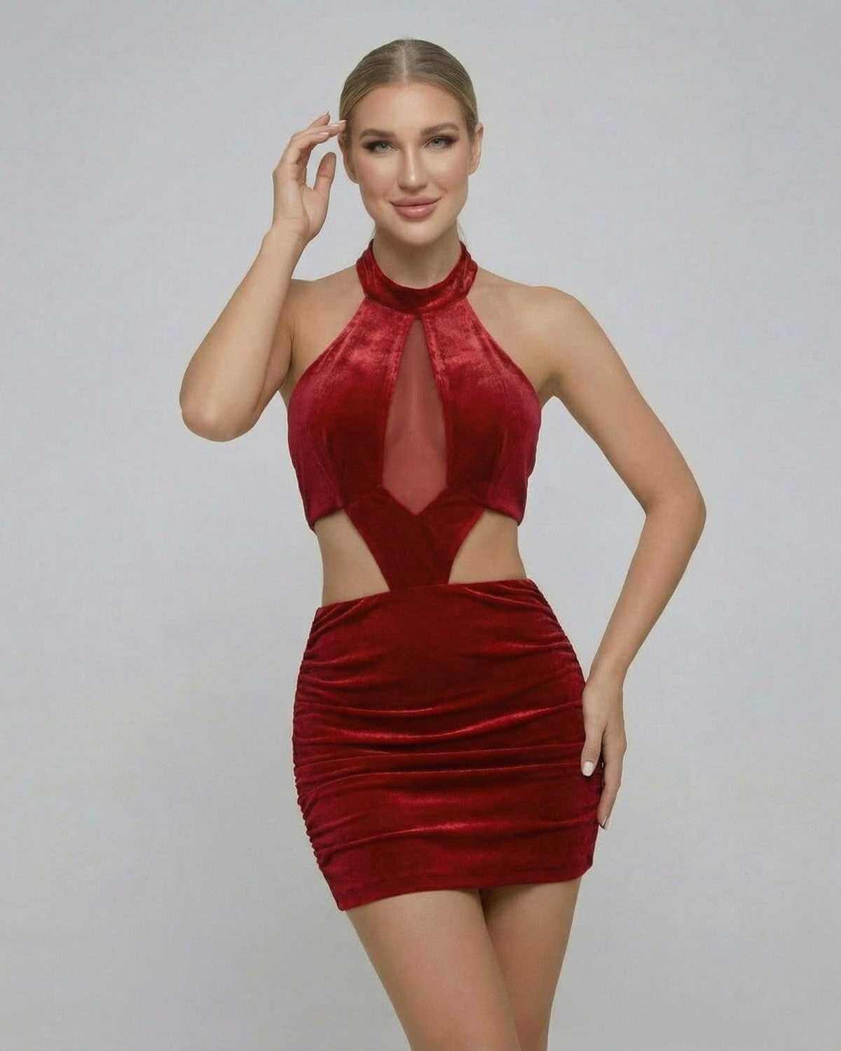 Valencia Mini Dress by SLIMONA - Red Velvet Bodycon Mini Dress with Sleeveless Halter Neck Design.