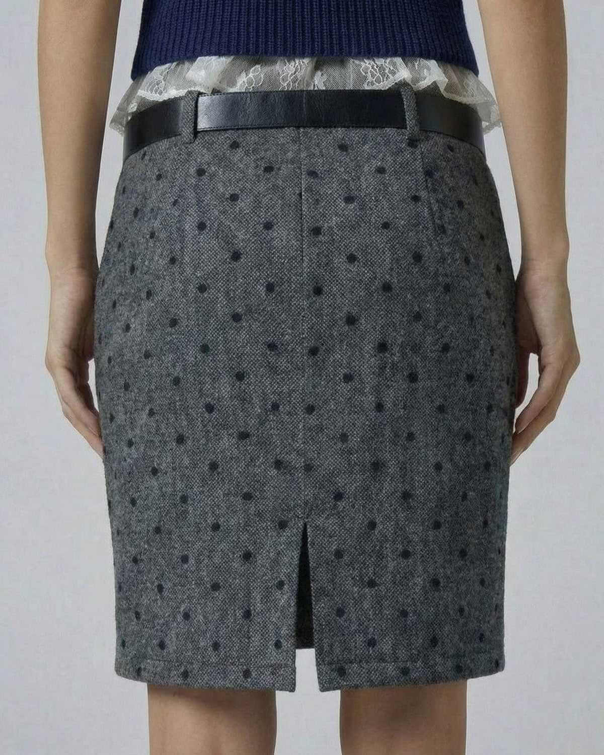 Lyra Mini Skirt by SLIMONA - Polka Dot Bodycon Fit with Zip Detail, emphasizing a sleek silhouette.