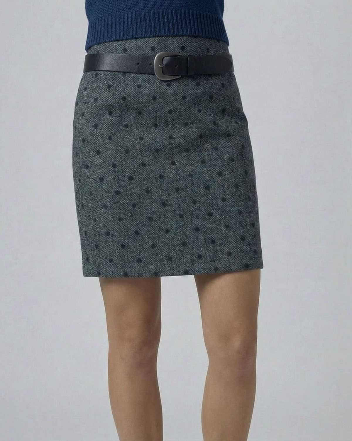 Lyra Mini Skirt by SLIMONA featuring a polka dot bodycon fit and zip detail for a stylish, confident look.