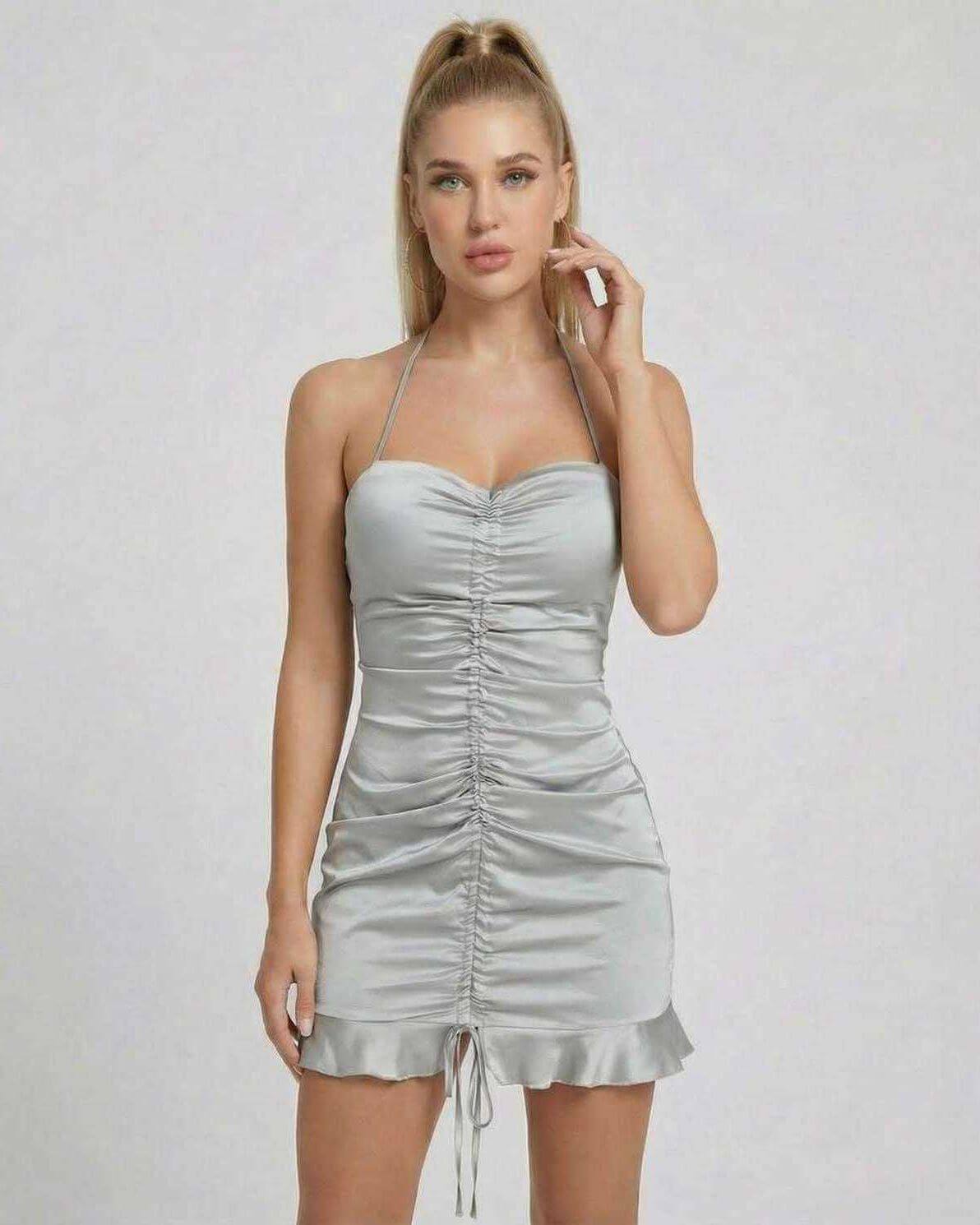 Celeste Mini Dress by SLIMONA, featuring a satin finish and ruched high-waist silhouette.