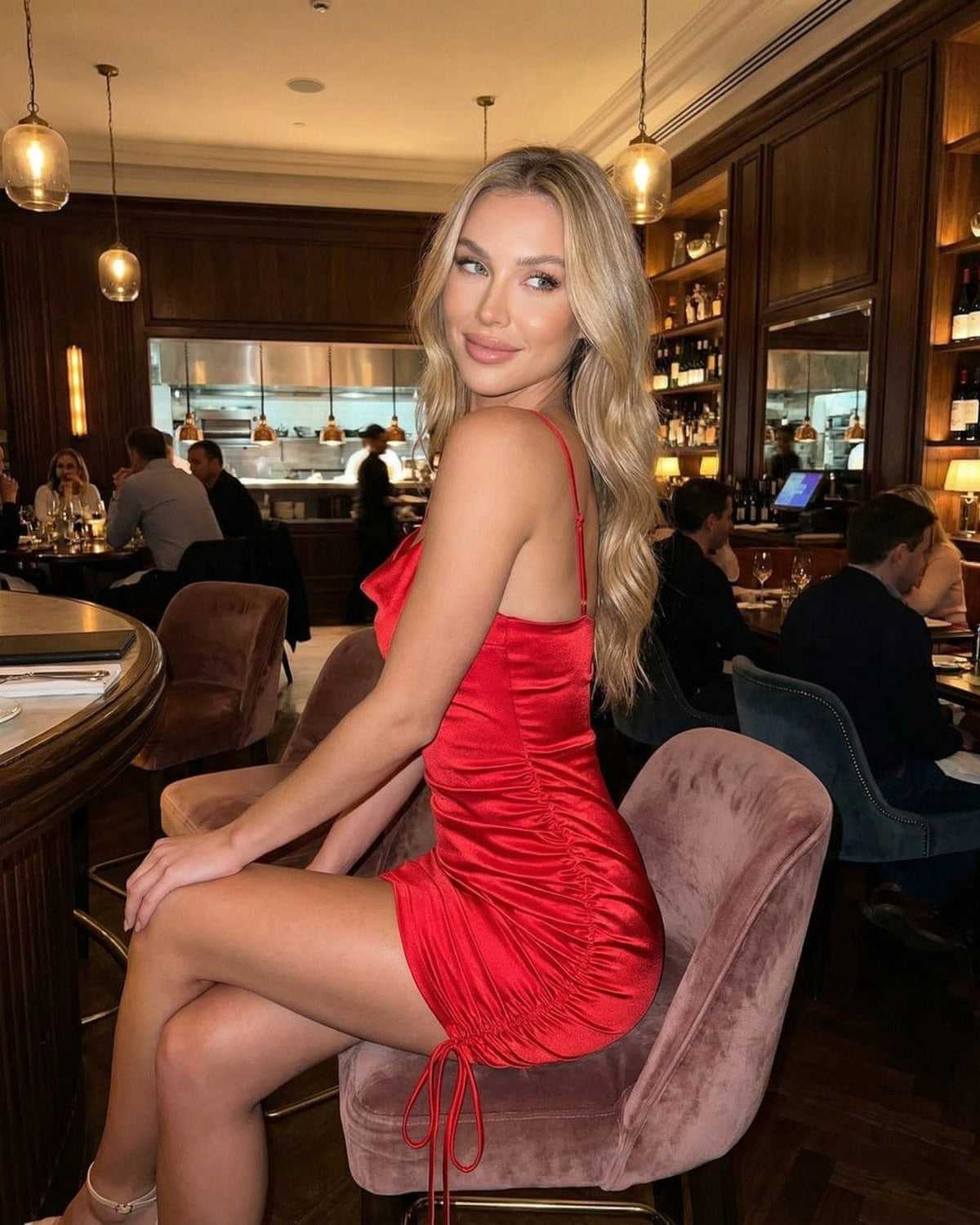 Valencia Mini Dress by SLIMONA, showcasing a stylish satin mini dress with ruched detail.