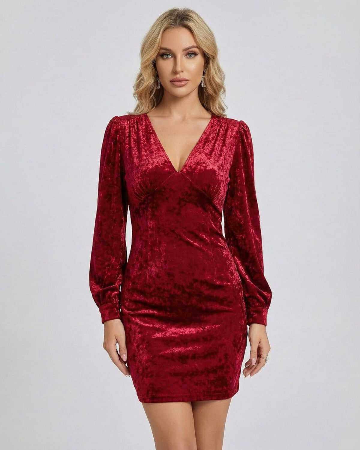 Valencia Mini Dress by SLIMONA in red velvet, featuring a V-neckline and long sleeves, perfect for elevated occasions.
