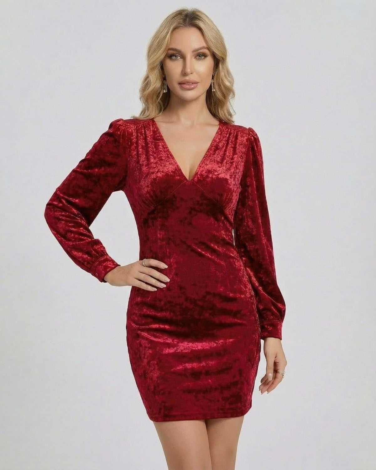 Valencia Mini Dress by SLIMONA in red velvet with long sleeves and V-neckline, perfect for an elevated occasion.