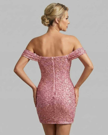 Aurora Mini Dress by SLIMONA - Back view of sequin bodycon mini dress with off-shoulder design in pink.