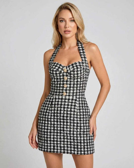 Aurelia Mini Dress by SLIMONA, halter neck plaid A-line mini dress with a fitted silhouette and button detail.