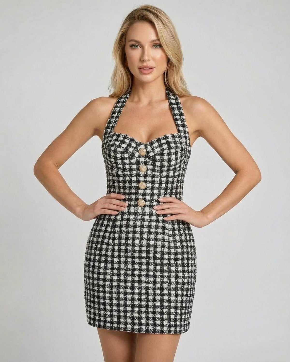 Aurelia Mini Dress by SLIMONA, halter neck plaid A-line mini dress featuring structured silhouette and tailored finish.