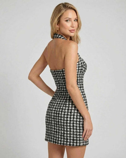 Aurelia Mini Dress in plaid design by SLIMONA, showcasing a halter neck and structured A-line silhouette.