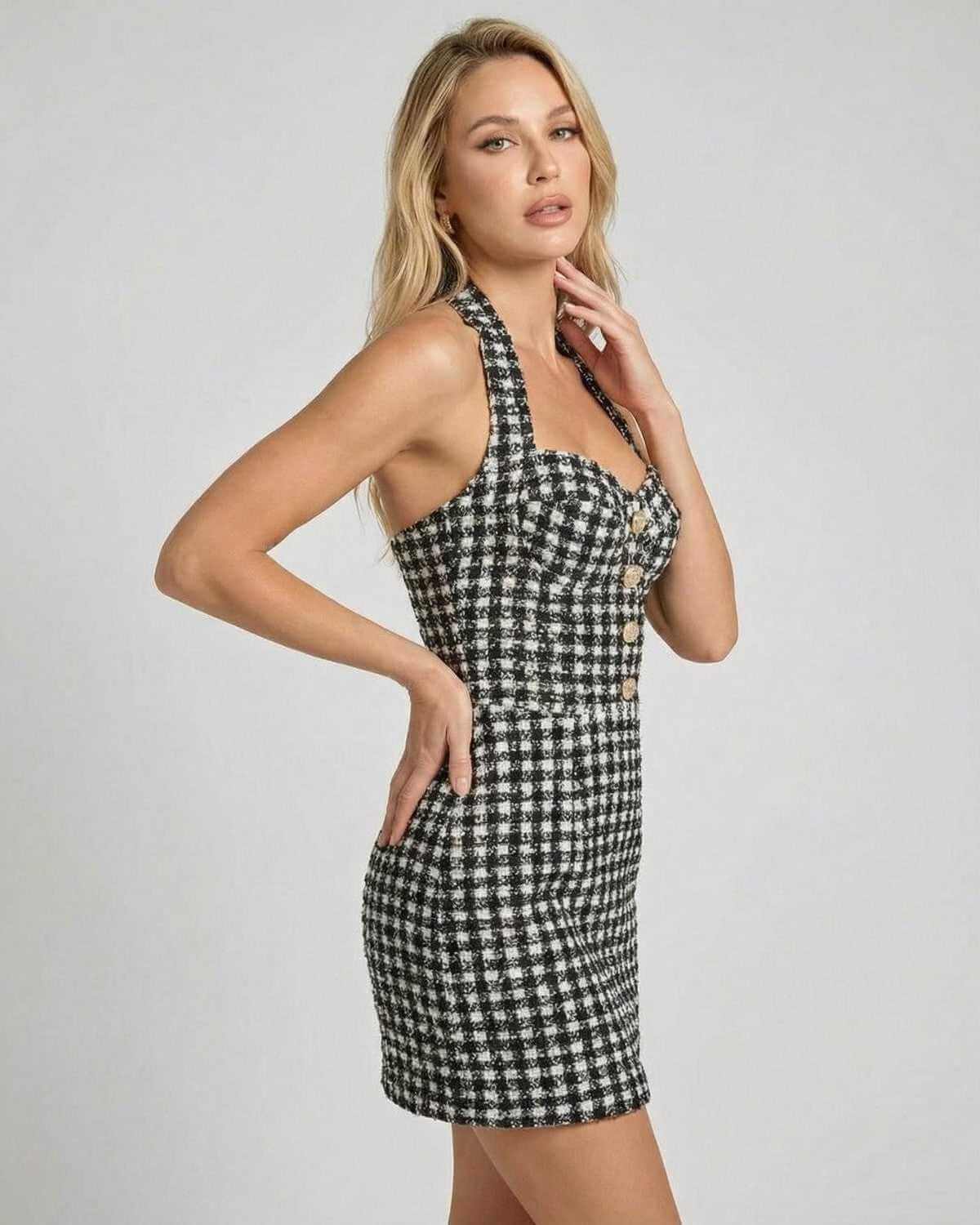 Aurelia Mini Dress by SLIMONA, featuring halter neck and A-line silhouette in classic plaid pattern.