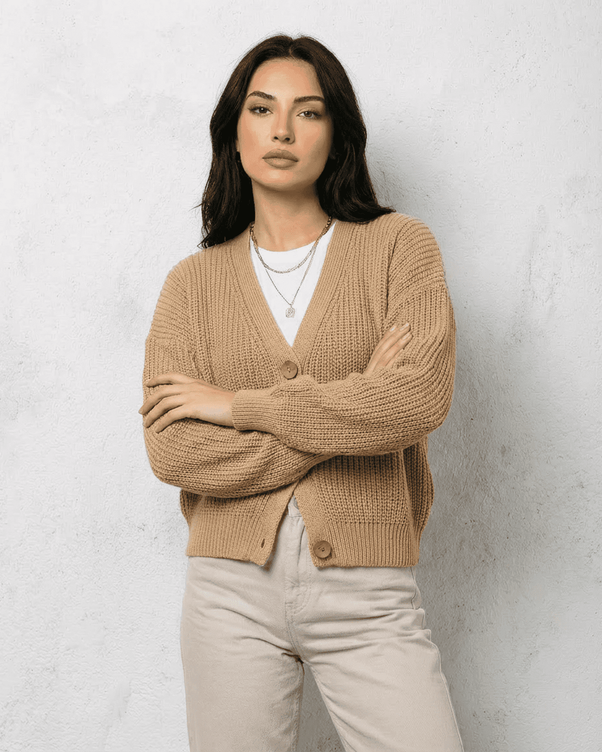 Saffron Cardigan by SLIMONA in elegant beige with relaxed fit and V-neck, perfect for cozy layering.