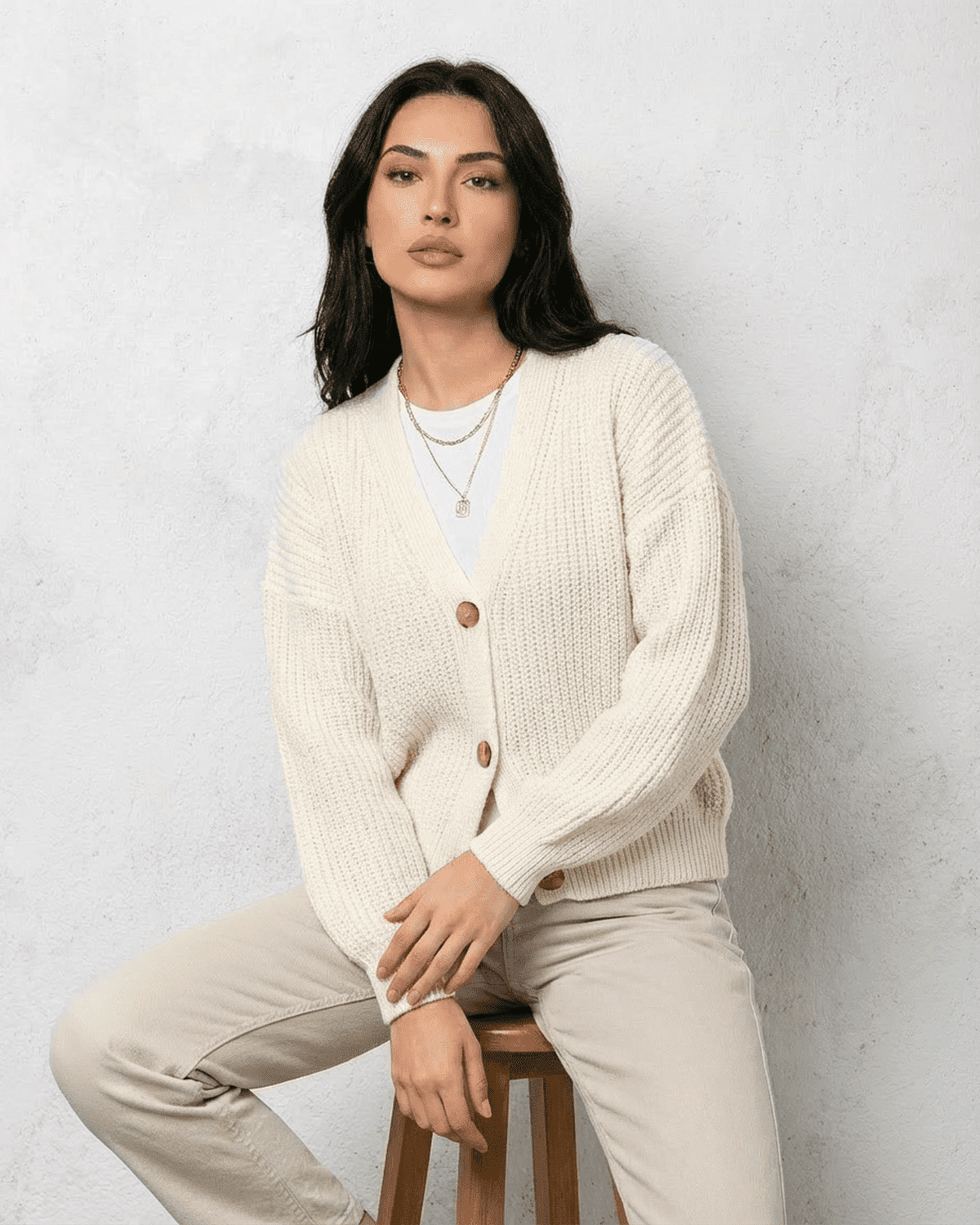 Alba Cardigan by SLIMONA, featuring a classic white knit with a soft V-neck and loose fit, perfect for fall and winter.