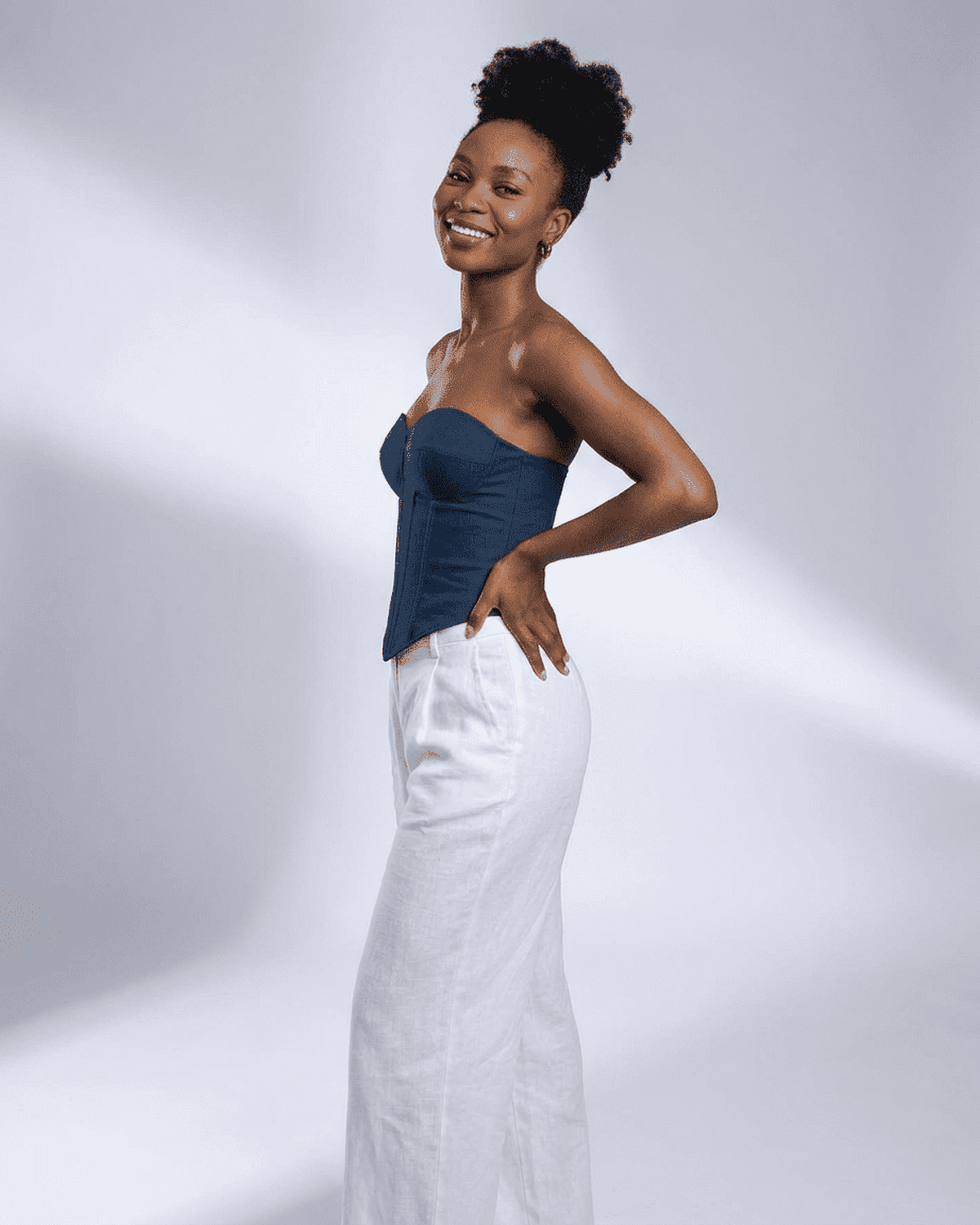 Atlas Corset Top by SLIMONA, featuring a navy faux denim bustier design.