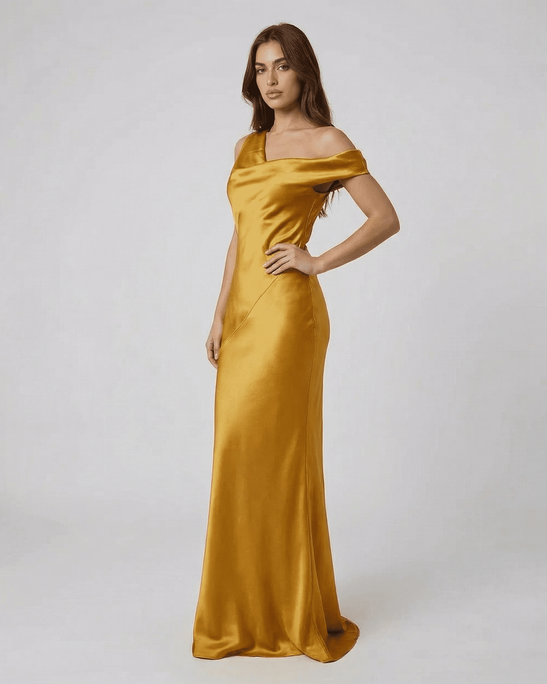 Aurelia Maxi Dress - SLIMONA satin gold maxi dress with a high waist and elegant open back.