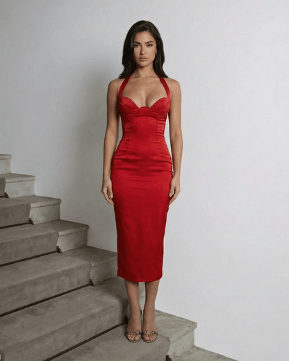 Aurelia Midi Dress by SLIMONA, showcasing a sculpted satin silhouette with halter neckline in red.