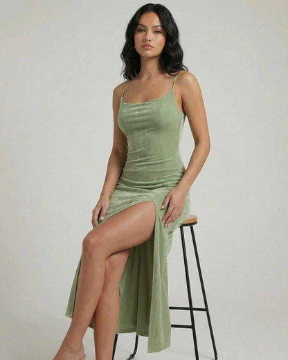 Aurelia Midi Dress by Lauven, featuring a square neckline and asymmetrical slit in green.