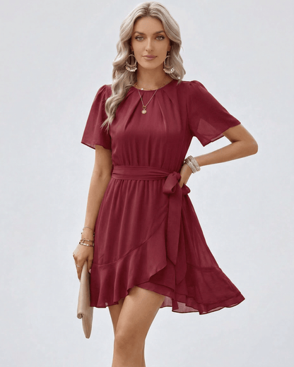 Burgundy Ruffle Dress by Lauven featuring waist tie and flutter sleeves, beautifully flowing and feminine.